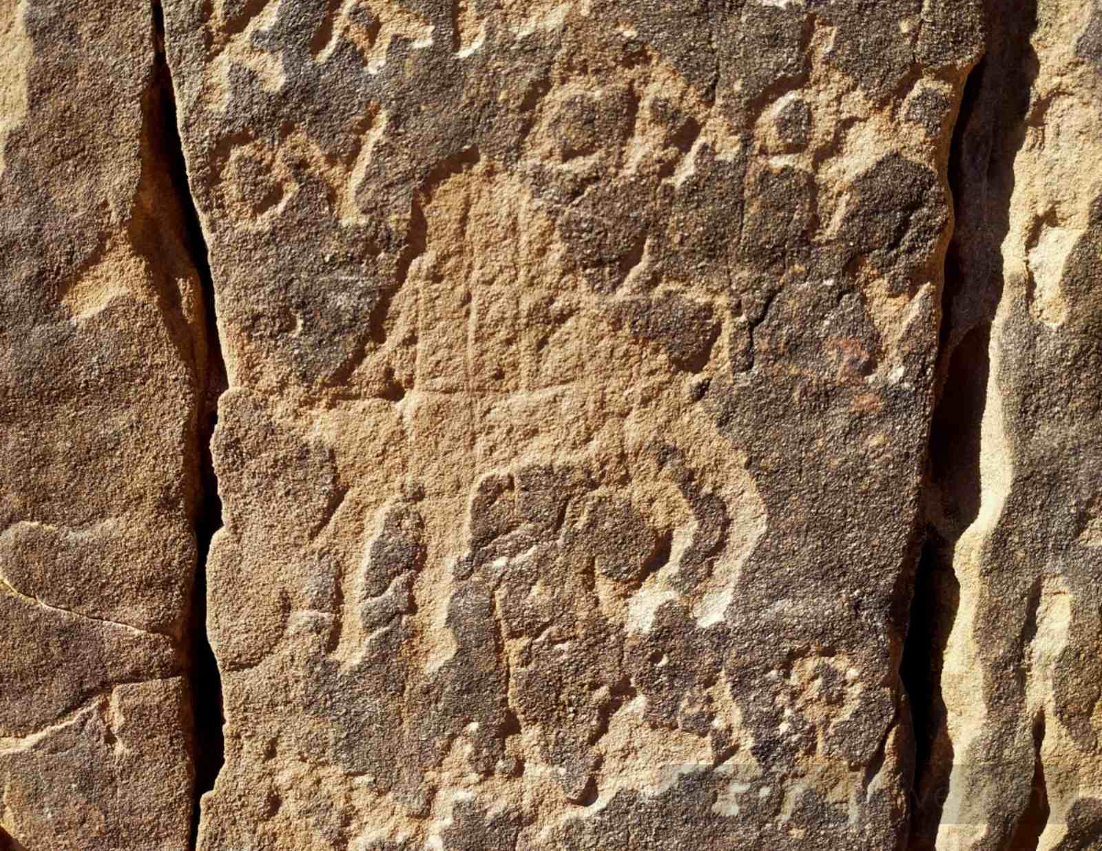 Ancient Nabatean-style rock inscription carved into sandstone at Wadi Mukatab in South Sinai, Egypt.